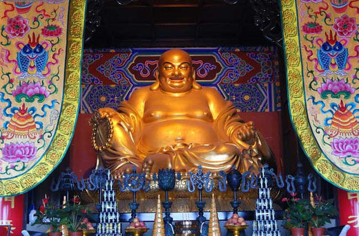 Why Temples Feature the Laughing Buddha Statue: Symbolism and Meaning