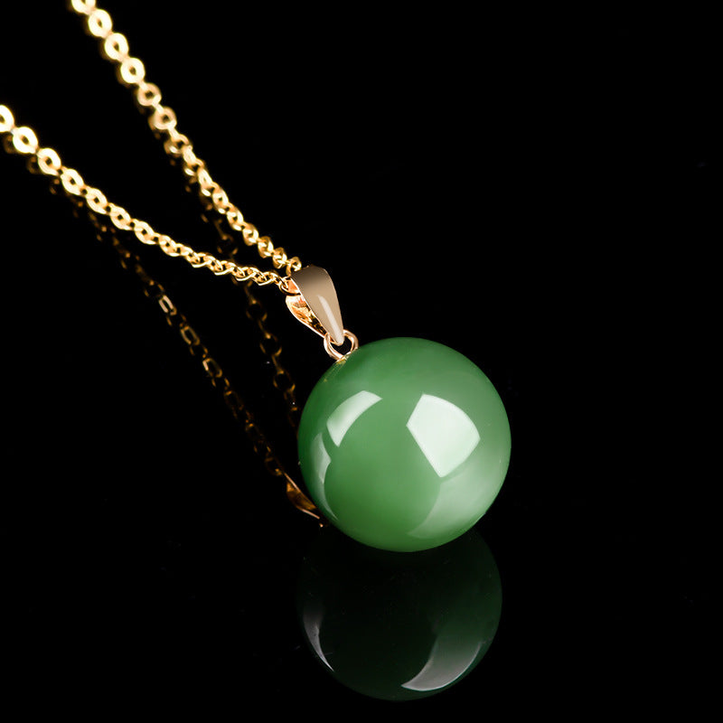 Natural Spinach Green Aged Hetian Jade Round Bead Pendant, beautifully set in 18K gold
