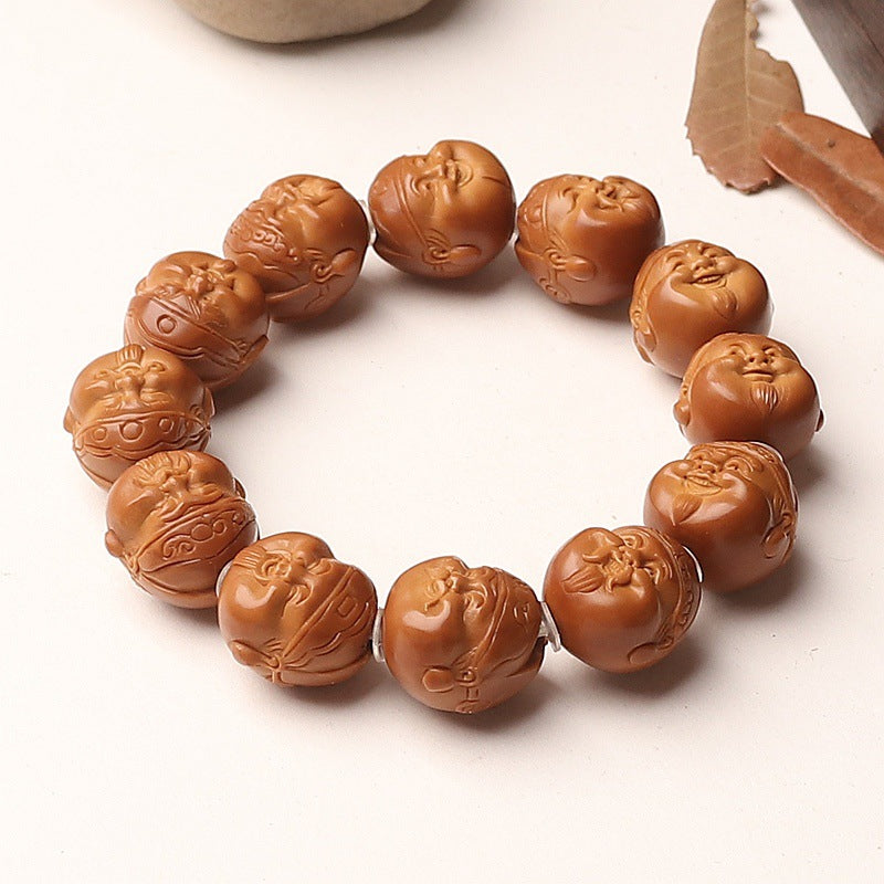 Hand-Carved Olive Pit Iron Core Bead Bracelet Featuring God of Wealth Head