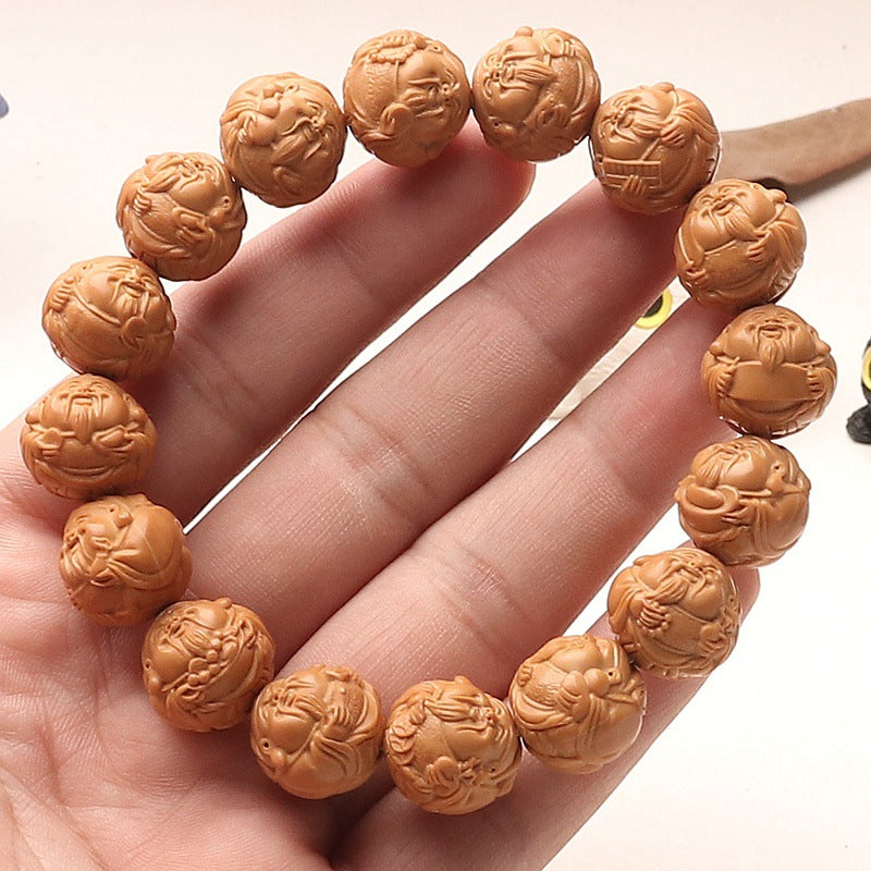 Hand-Carved Monkey Head Walnut Bracelet Featuring God of Wealth Design