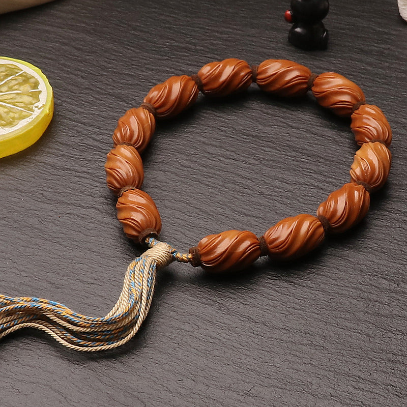 Hand-Carved Wenwan Olive Nut Twist Bracelet – Symbol of Turning Fortune