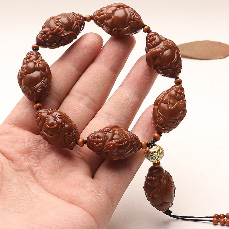 Double-Sided Olive Pit Bracelet with Carvings of Auspicious Beast and Maitreya