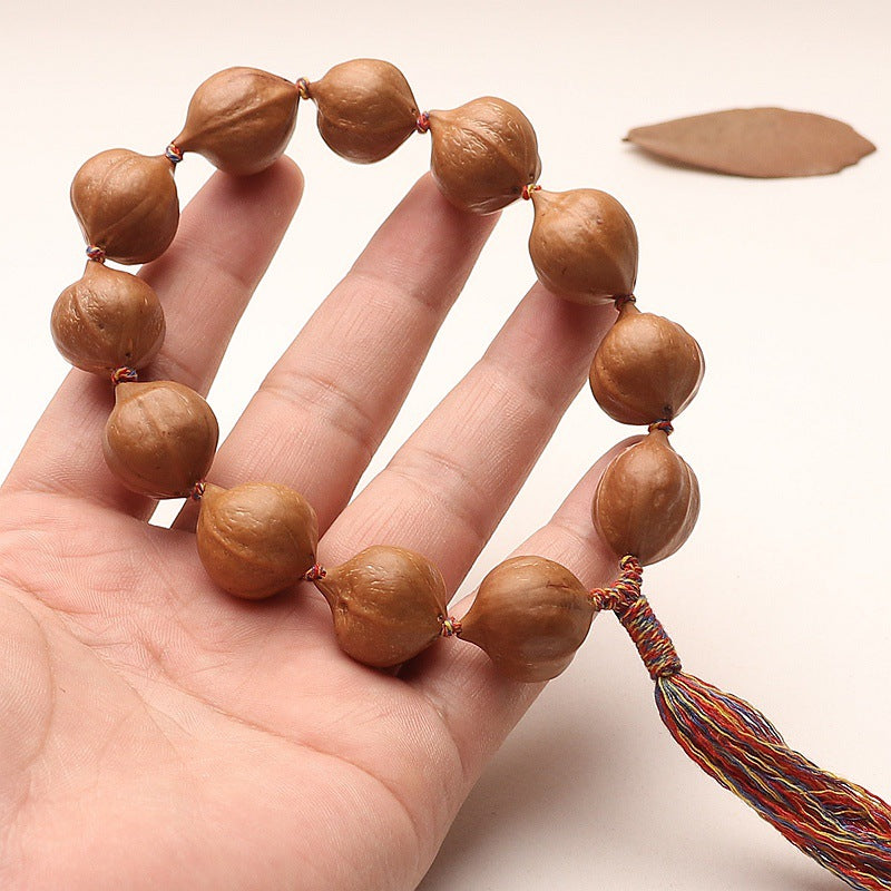 Natural Wenwan Olive Pit  "Peach" Shape Bracelet