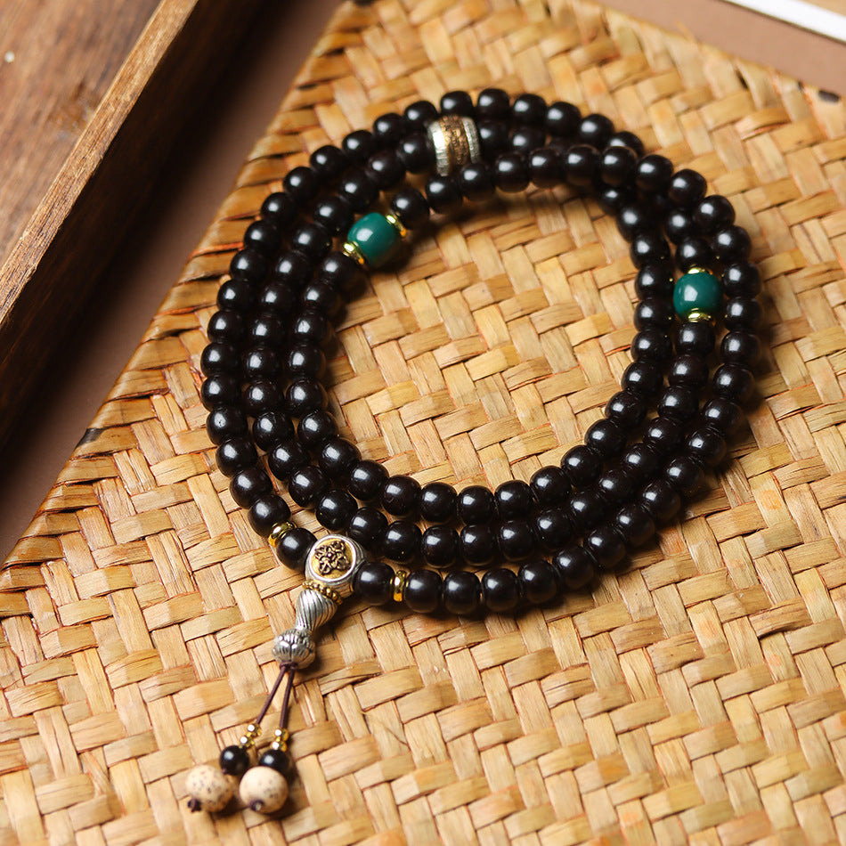 108 Mala Beads Bracelet in Natural Indonesian Black Gold Coconut Crown with Tibetan Silver Guru Bead