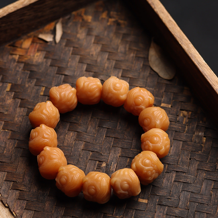 Awakening Lion Bracelet Hand-Carved from Weathered Bodhi Beads