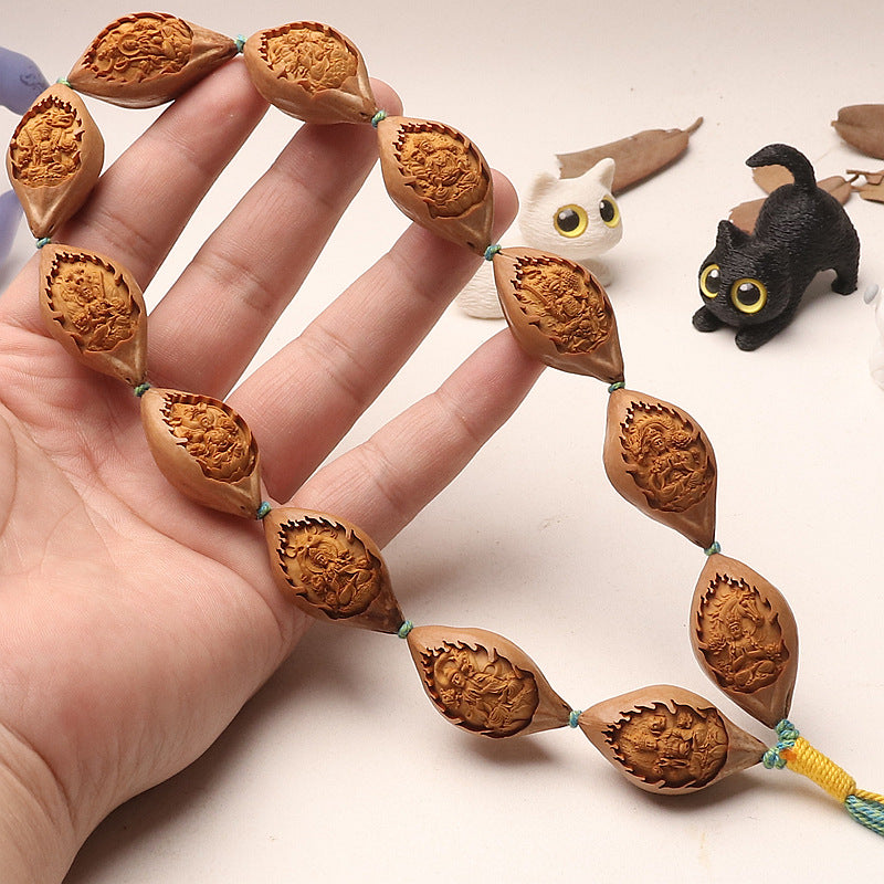Hand-Carved Olive Pit Chinese Zodiac & Guardian Buddha Long Bead Bracelet