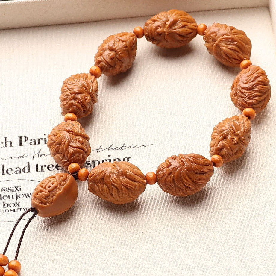 Premium Hand-Carved Olive Pit Bracelet Showcasing Legendary Sun Wukong Design