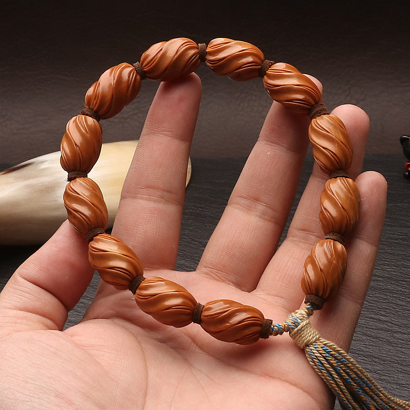 Hand-Carved Wenwan Olive Nut Twist Bracelet – Symbol of Turning Fortune